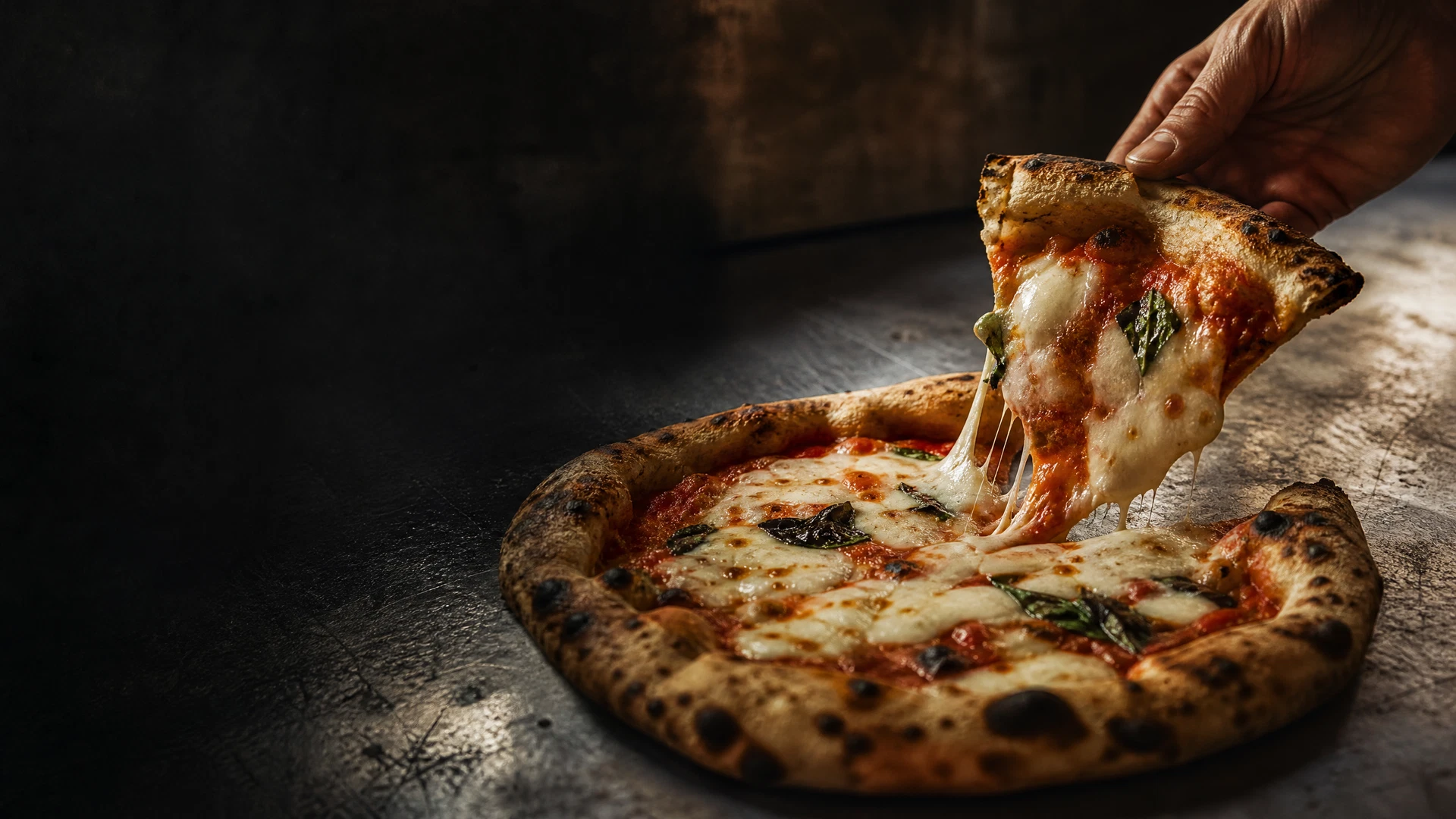 A freshly made pizza being served